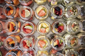 A variety of fruit-filled jars arranged in rows. - Designhotel Gius La Residenza (Caldaro Sulla Strada del Vino)