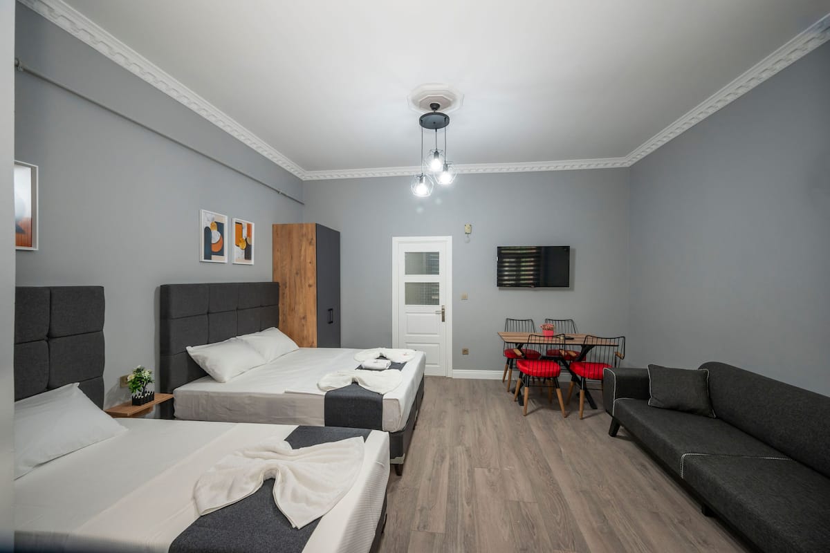 O) Family Suite | Living area | LED TV