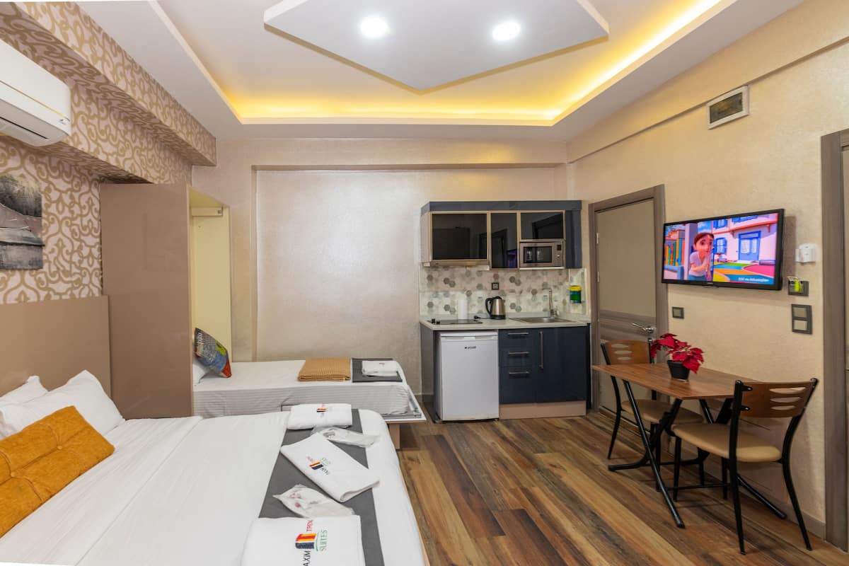 D) Deluxe Studio Entrance Floor | Living area | LED TV