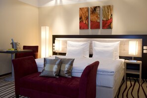 Ropa de cama de alta calidad y minibar 