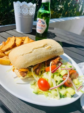 A meal consisting of a sandwich, fries, and a salad on a white plate. - The Queens Head (Durham)