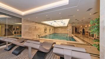 Indoor pool, seasonal outdoor pool, open noon to 10 PM, sun loungers