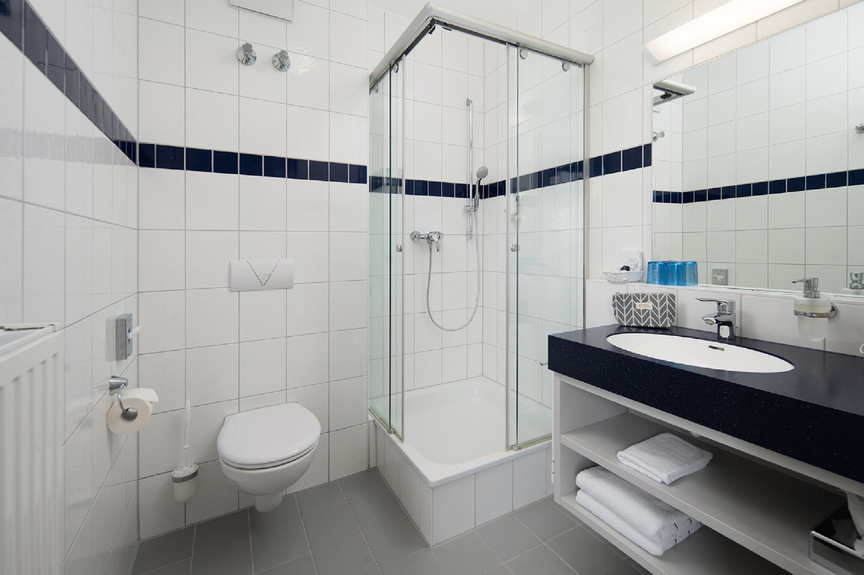 shower, free toiletries, hair dryer, towels