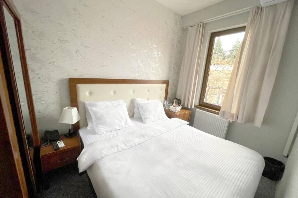 Family Quadruple Room | Premium bedding, blackout drapes, soundproofing