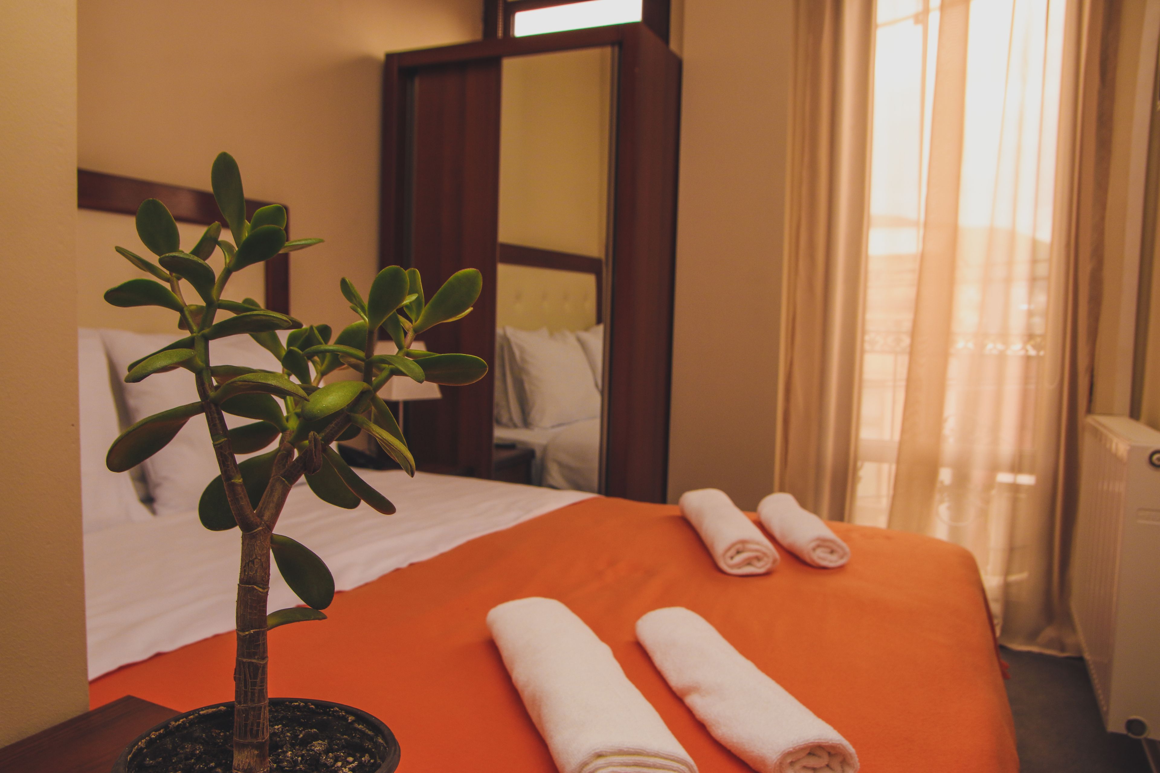 Premium bedding, blackout curtains, soundproofing, iron/ironing board