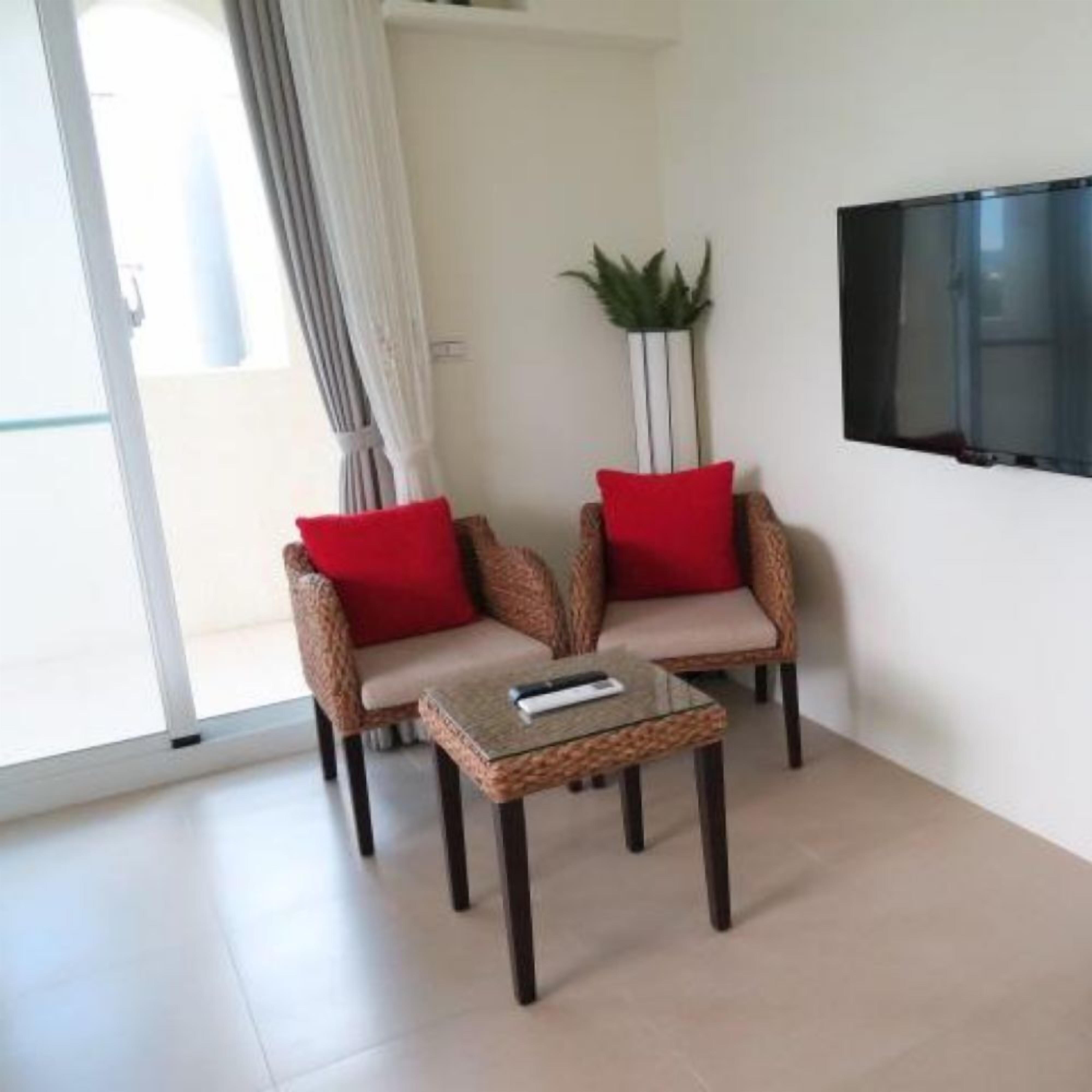 Family Quadruple Room | Living area | LCD TV