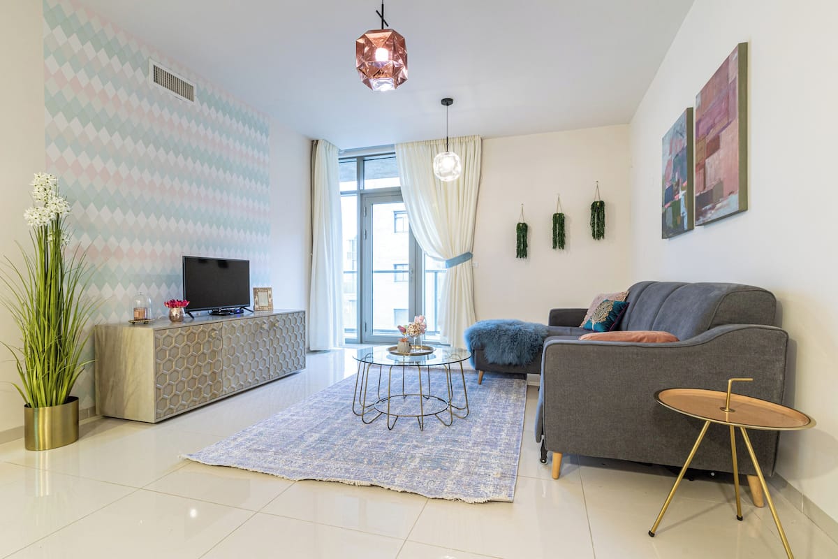 Design appartement, 1 slaapkamer | 1 slaapkamer, een kluis op de kamer, verduisterende gordijnen