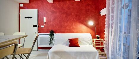 Apartment, 1 Bedroom | 1 bedroom, desk, iron/ironing board, free cribs/infant beds