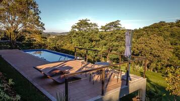 Outdoor pool, pool umbrellas, pool loungers