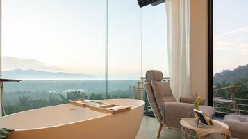 Deluxe Room, Sea View | Minibar, in-room safe, individually decorated, individually furnished