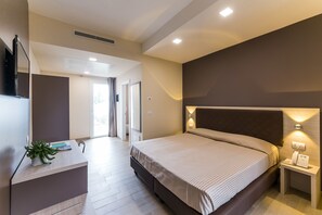 Chambre Familiale | Literie de qualité supérieure, minibar, coffres-forts dans les chambres