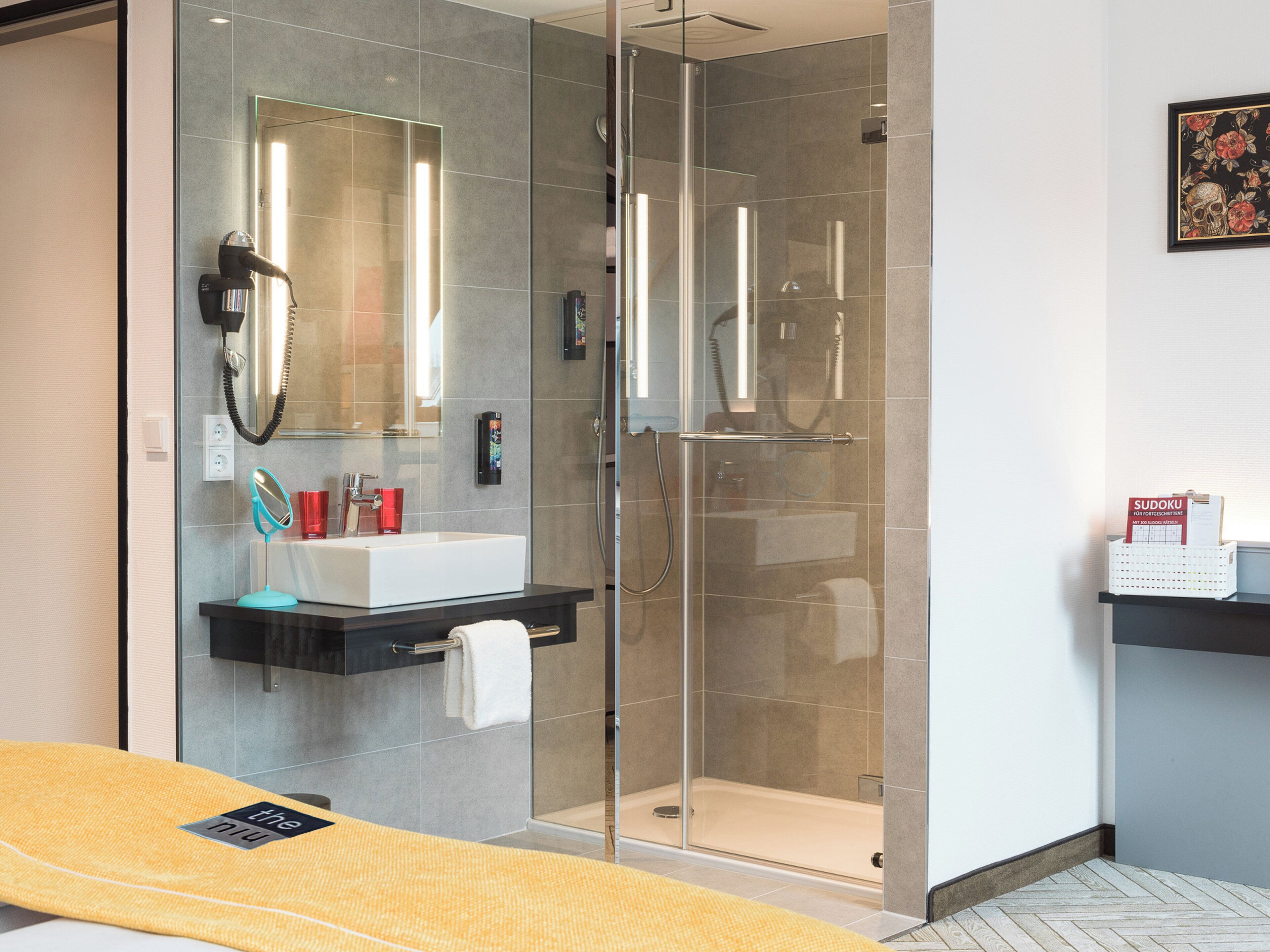 shower, free toiletries, hair dryer, towels