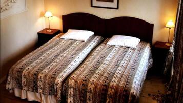 Blackout curtains, iron/ironing board, rollaway beds, free WiFi