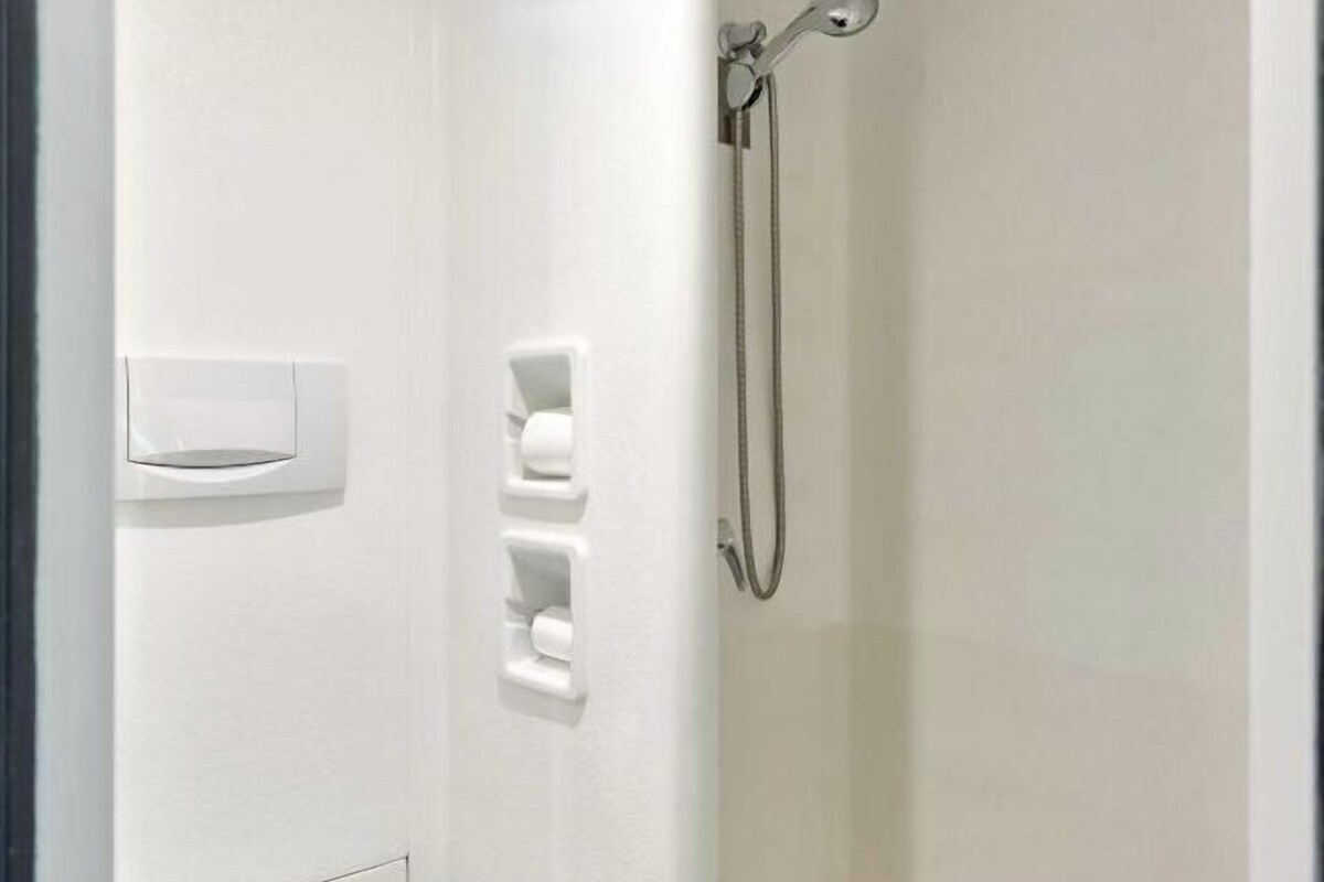 Shower, towels, soap, shampoo