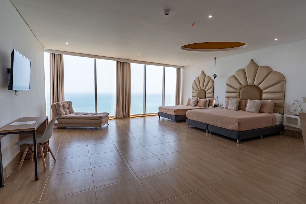 Junior Suite Ocean View | 1 bedroom, premium bedding, minibar, in-room safe