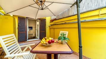 Deluxe Room, Bathtub | Terrace/patio