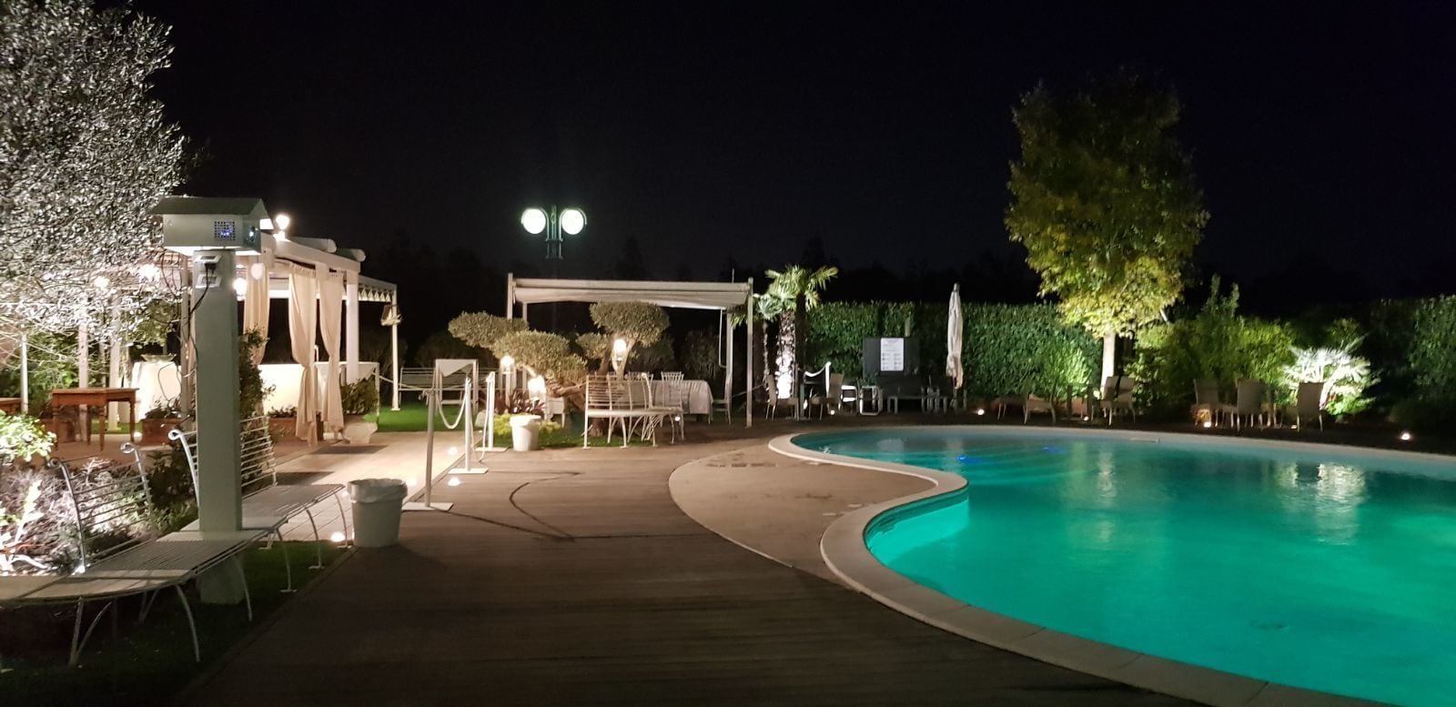 seasonal outdoor pool, open 6 am to 7 pm, pool umbrellas, pool loungers