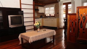 Suite, balcón | Zona de estar