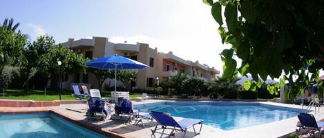 Outdoor pool, pool umbrellas, pool loungers
