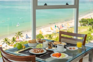 Breakfast, lunch, dinner served; beach views