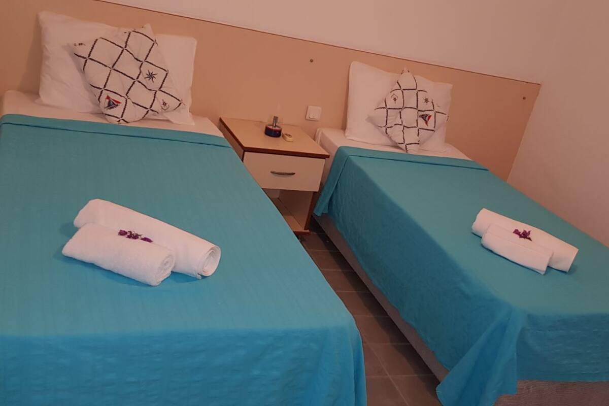 Deluxe Triple Room | Minibar, desk, laptop workspace, free WiFi