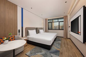 Premium bedding, down comforters, blackout drapes, free WiFi