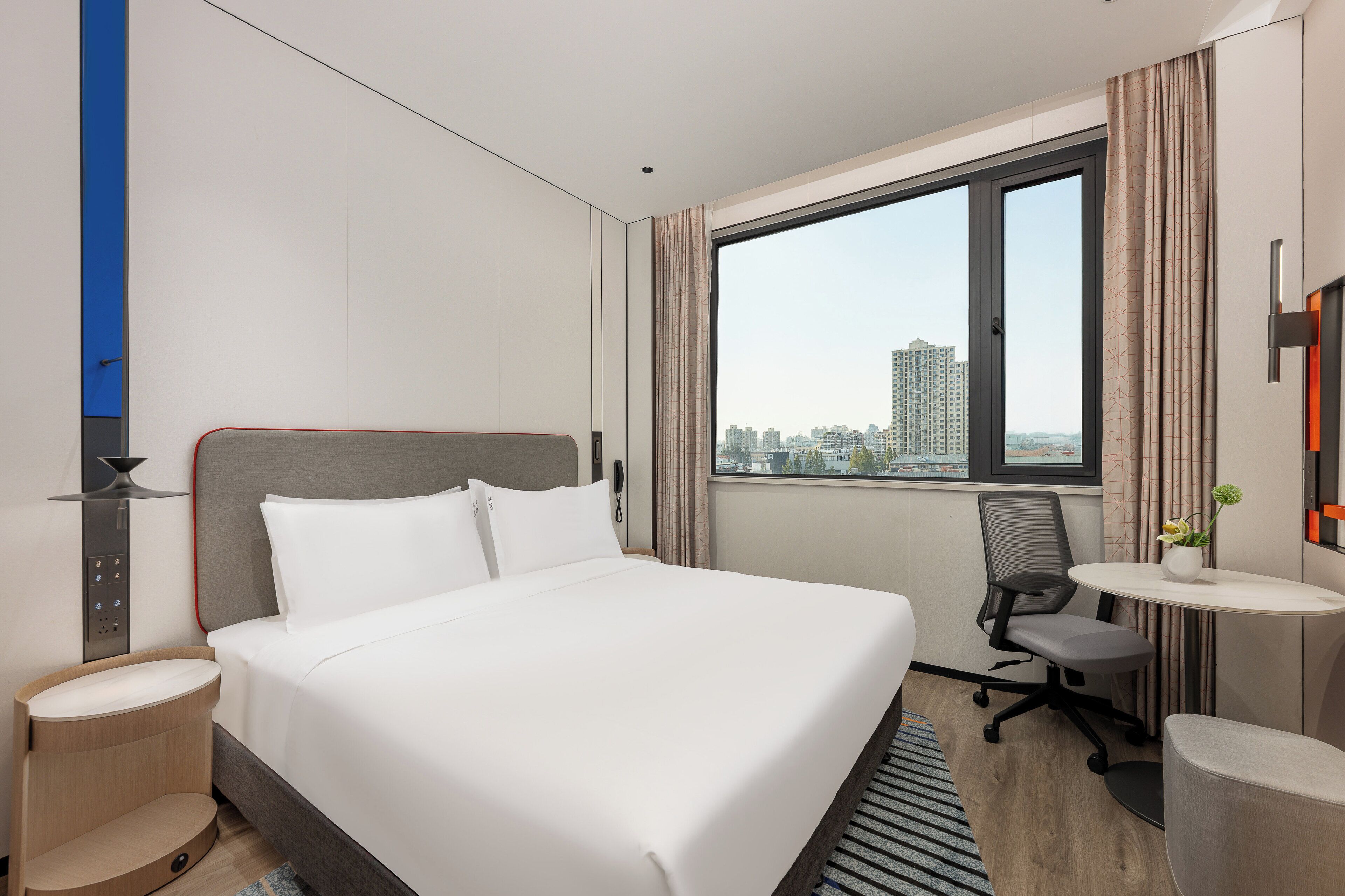 Premium bedding, down comforters, blackout drapes, free WiFi