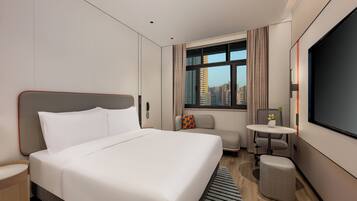1 King Standard Extra Floor Space | Premium bedding, down comforters, blackout drapes, free WiFi