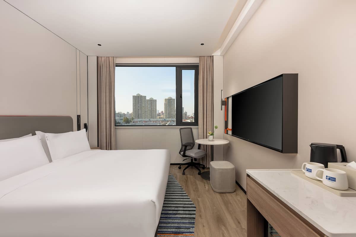 1 King Standard | Premium bedding, down comforters, blackout drapes, free WiFi