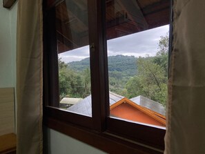 Duplex família | Roupas de cama premium, frigobar, individualmente decorados