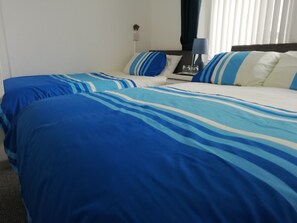 Kamar Triple Comfort, Beberapa Tempat Tidur | Seprai premium dan didekorasi berbeda-beda