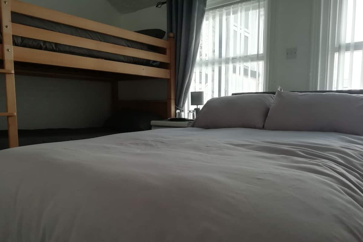 Family room up to 4   | Premium bedding, free WiFi, individually decorated