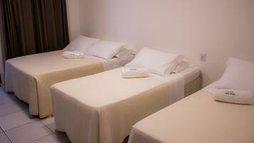 Standard Quadruple Room | 1 bedroom, minibar, blackout curtains, iron/ironing board