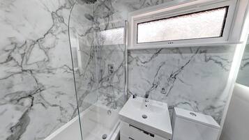 Combined shower/bathtub