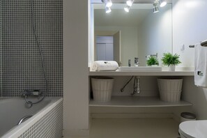 Bathtub, hair dryer, towels