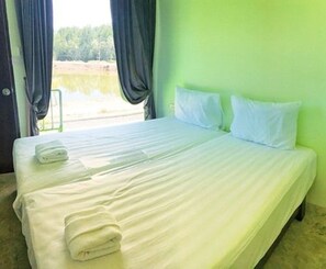 Standard Twin Room | Blackout drapes, free WiFi, bed sheets - T-House (Ratsada)