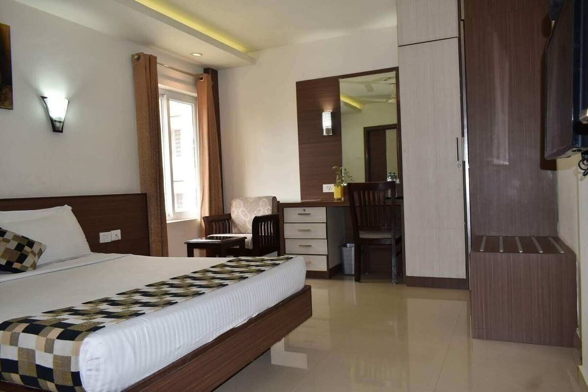 Premium bedding, desk, laptop workspace, soundproofing
