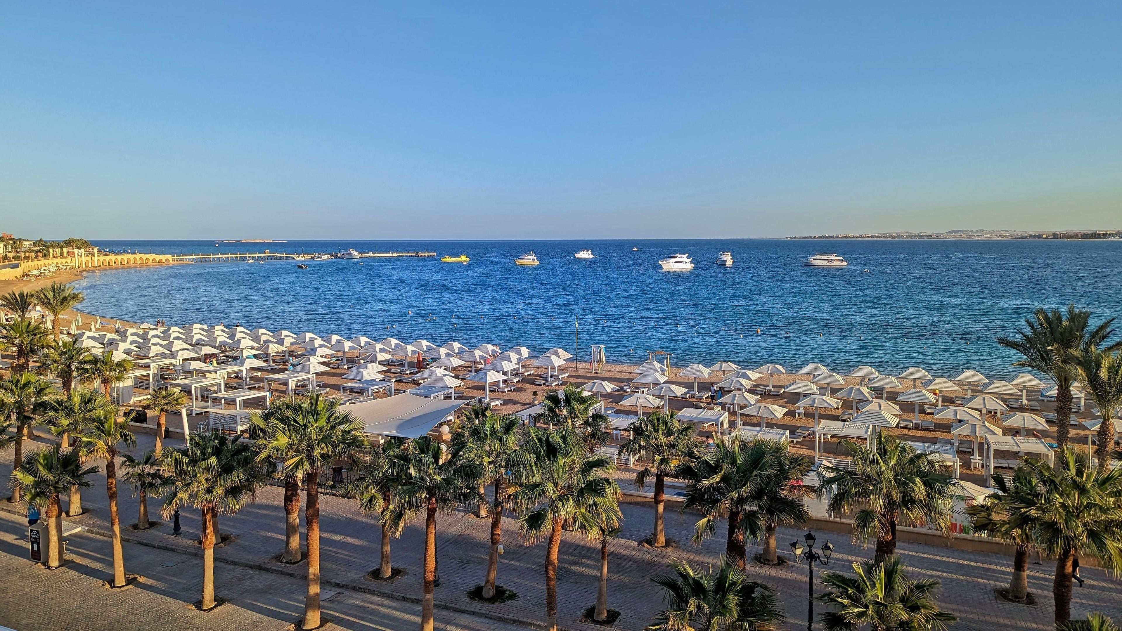 Private beach, beach umbrellas, beach towels, scuba diving