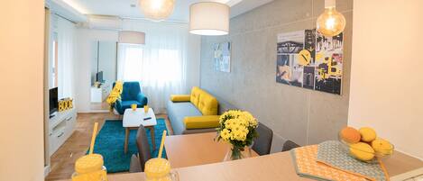 Superior Apartment, 1 Bedroom | Living area | 43-inch flat-screen TV with cable channels, TV, table tennis