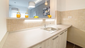 Fridge, stovetop, electric kettle, toaster