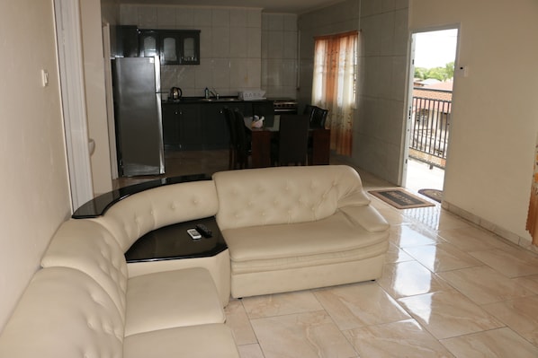 Family Apartment, 2 Bedrooms | Living area | Flat-screen TV