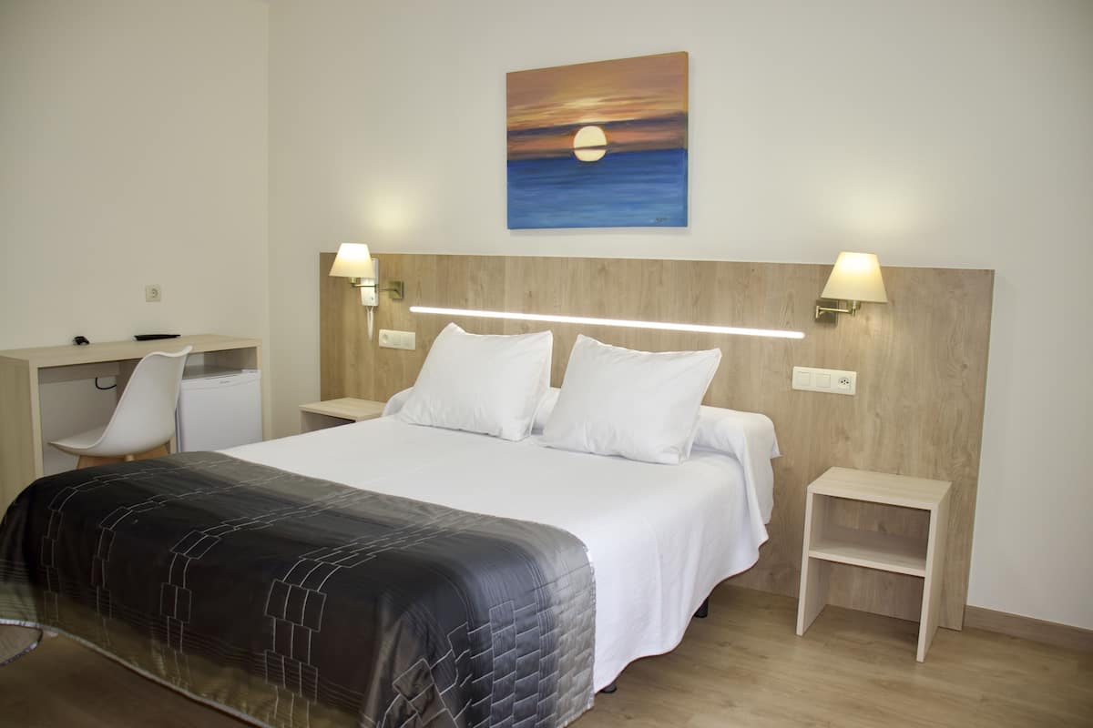 Premium bedding, memory-foam beds, in-room safe, desk