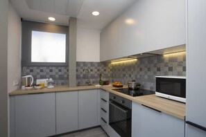 Frigorífic, microones, forn i placa de cuina 