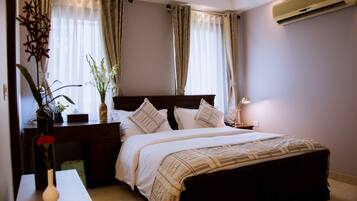 Deluxe Double Room, 1 Queen Bed, Refrigerator | 1 bedroom, premium bedding, down duvets, in-room safe