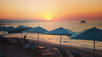 On the beach, beach towels