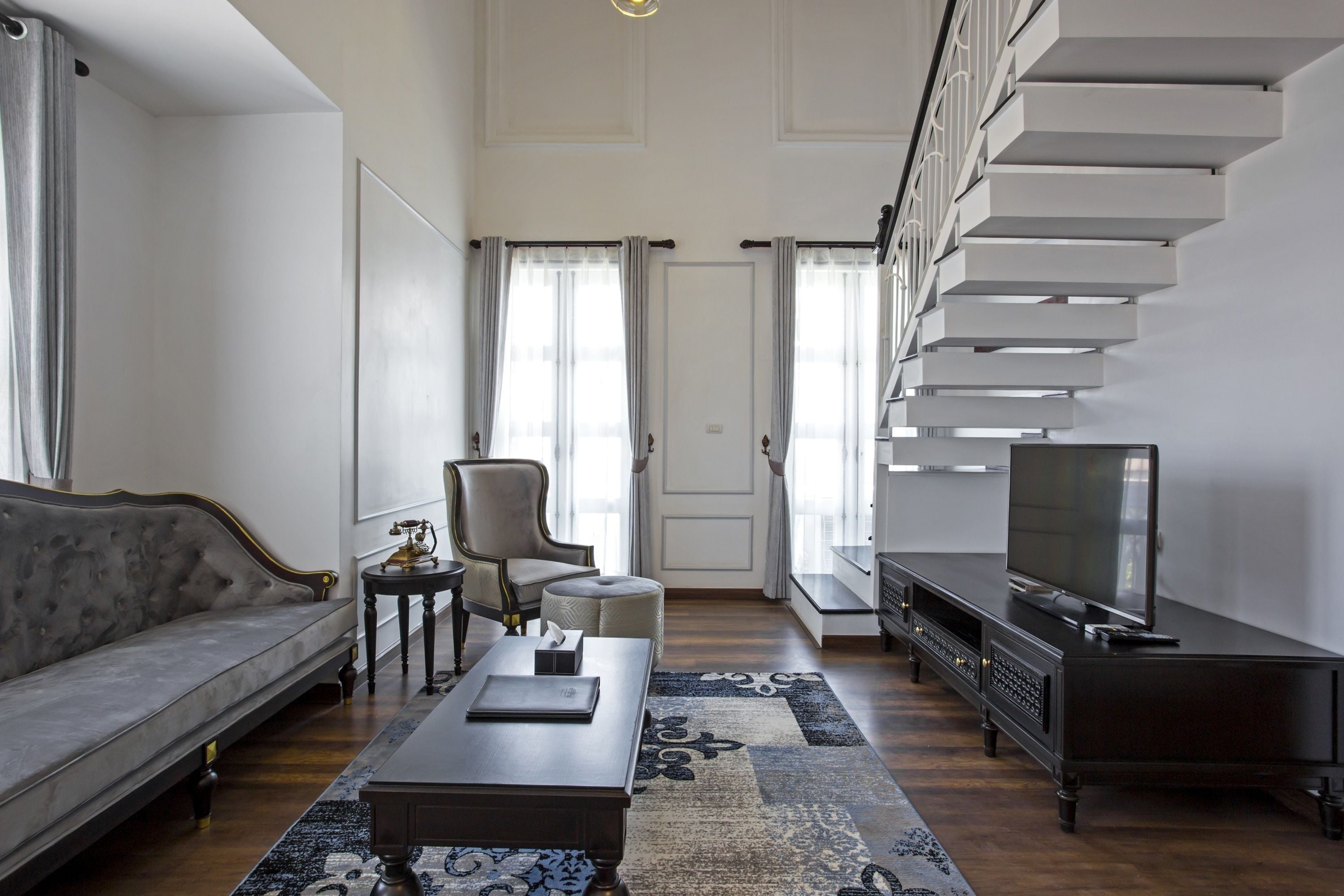 le thatluang suite | living area | flat-screen tv