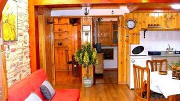 Superior Suite, 2 Bedrooms | Living area | Flat-screen TV