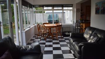 House, 4 Bedrooms, Garden Area | Living area | Flat-screen TV