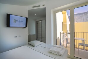 Ropa de cama de alta calidad, minibar y escritorio 