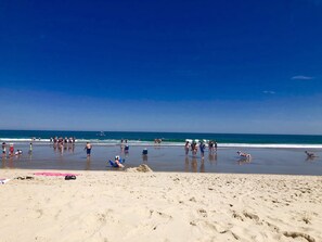 On the beach, beach towels